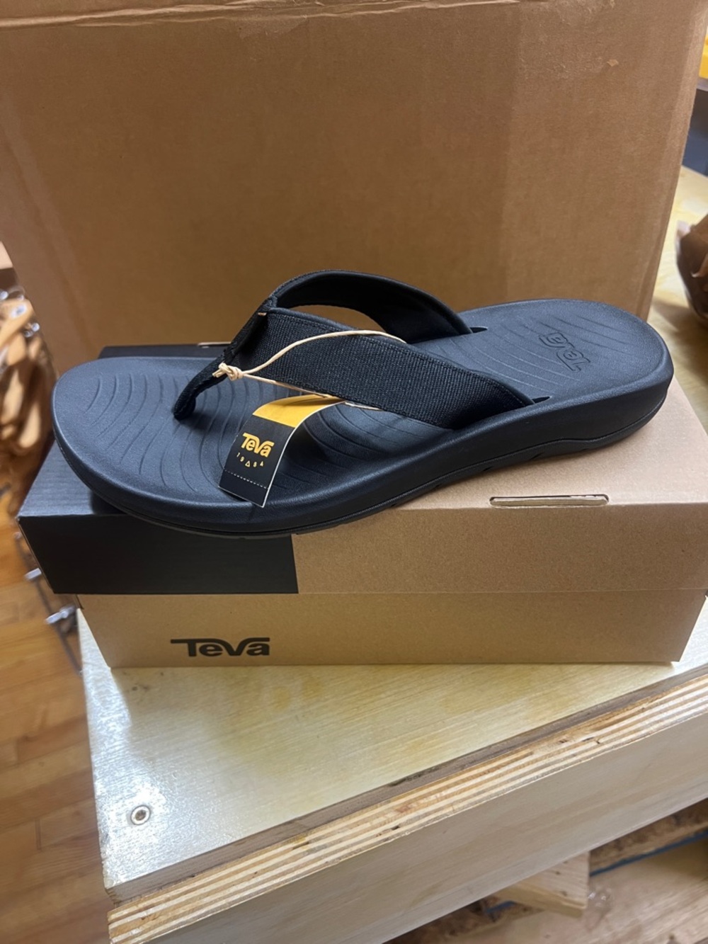 Teva Men's Black Flip-Flop Sandal with Gold Accent
